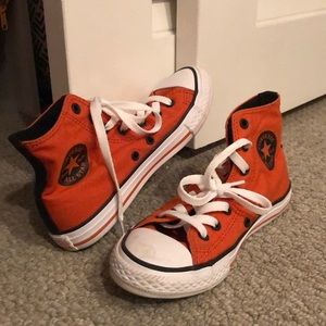 Orange high top converse